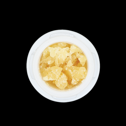 Banana Cream THCa Crumble extract by Miracle of The Desert showing golden crumble with banana flavor notes.
