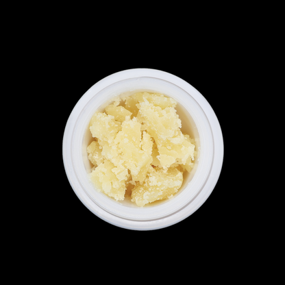 Pink Runtz THCa crumble by Miracle of The Desert in a vibrant pink color with a crumbly texture on a white background.