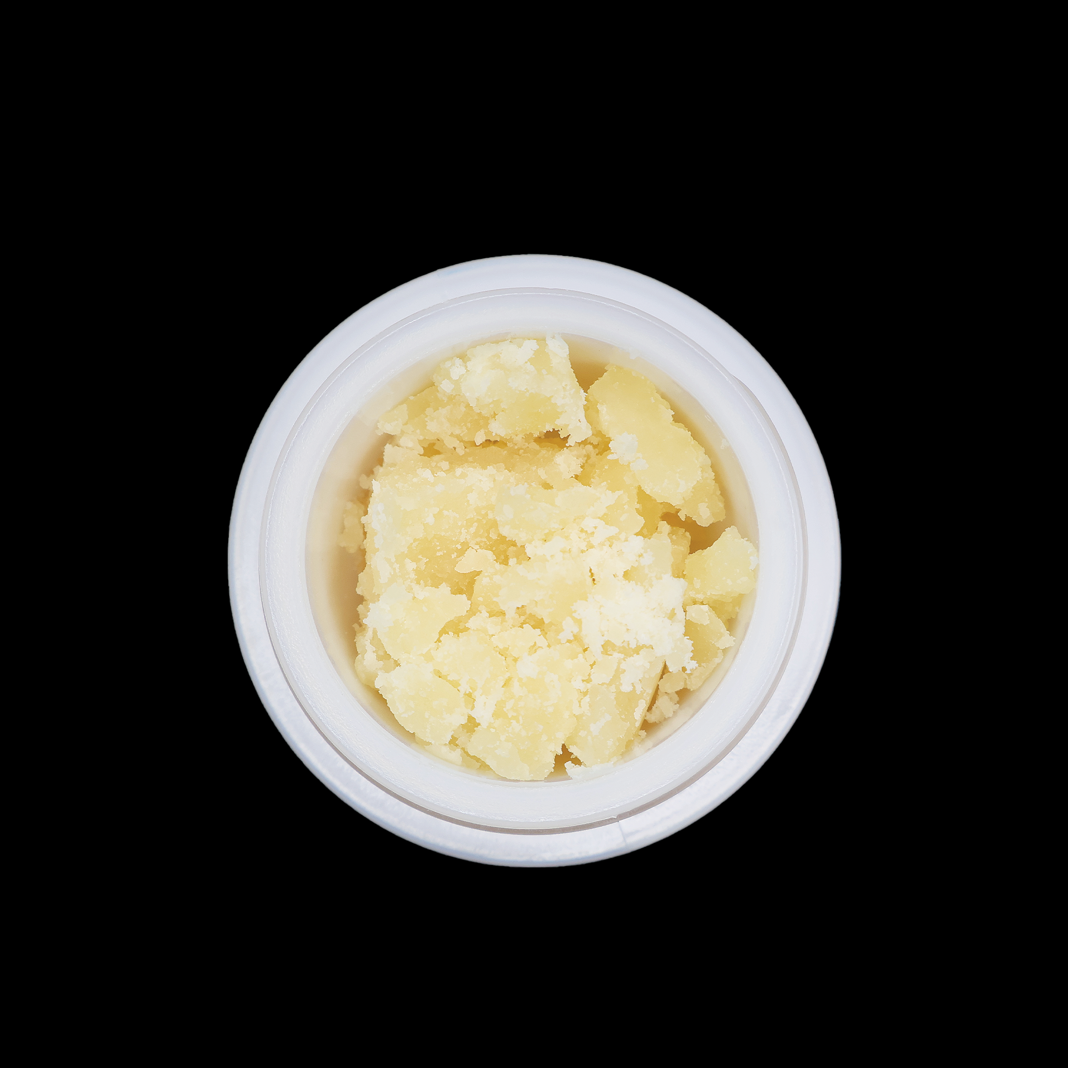 Miracle of The Desert Sangria THCa Crumble extract in a glass jar, showcasing vibrant red-orange crumble texture.