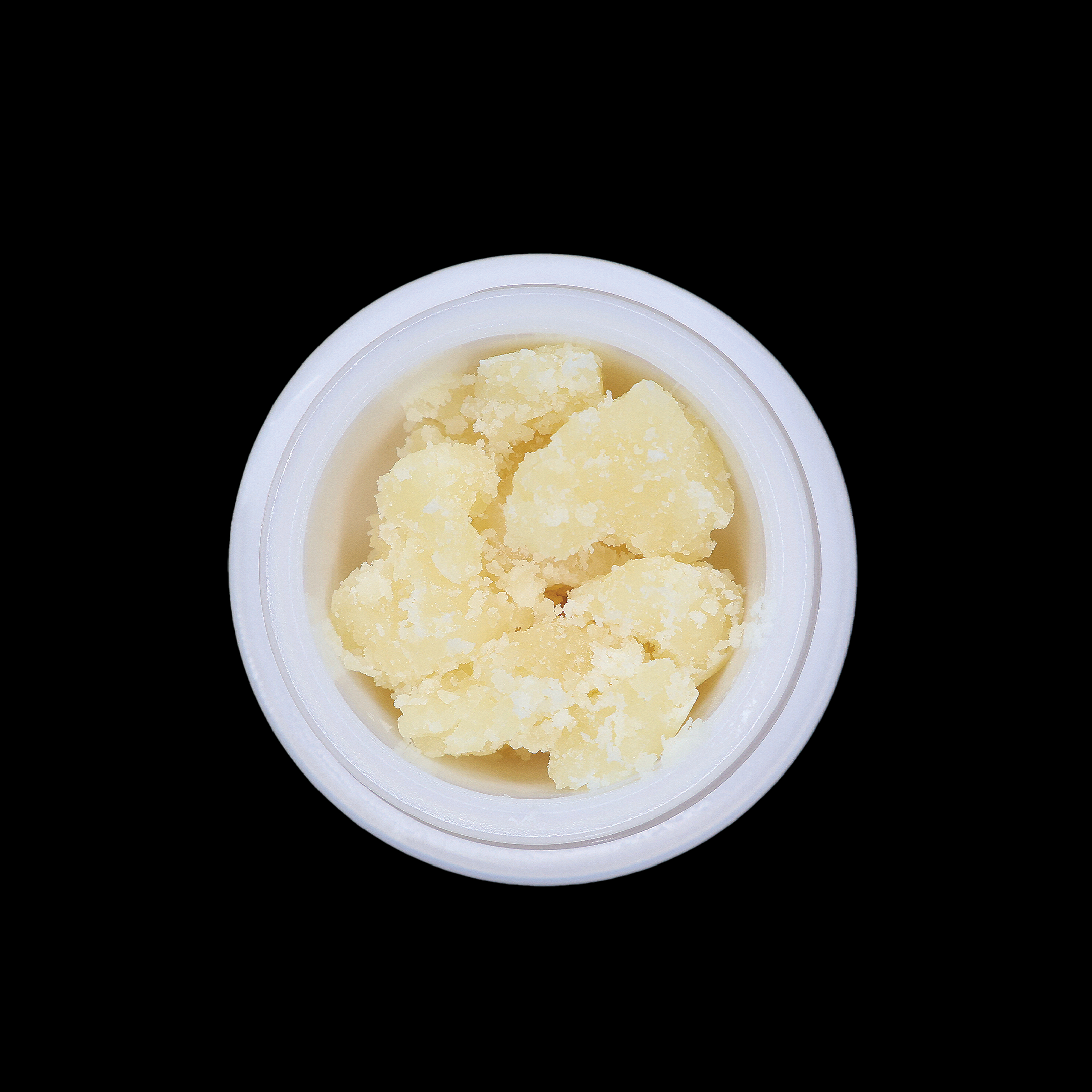 Skywalker THCa Crumble extract from Miracle of The Desert, showing golden, crumbly concentrate in a clear container.