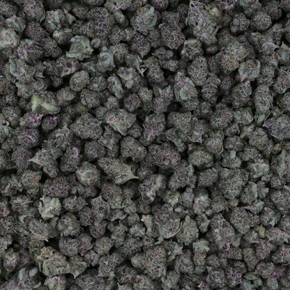 Close-up of Superboof THCa Micro Smalls Flower from Miracle of the Desert, showcasing vibrant buds and crystalline trichomes.