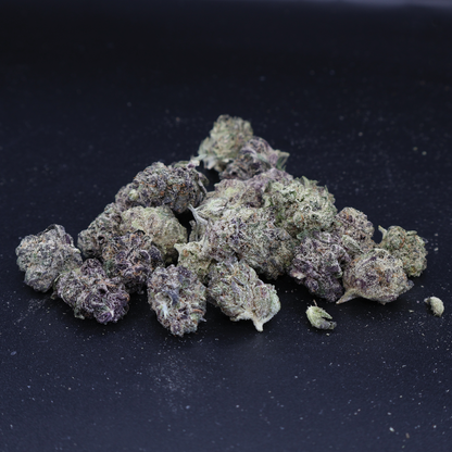 Miracle of the Desert Blizzard Bush THCA Flower small buds with frosty trichomes and vibrant green coloration.