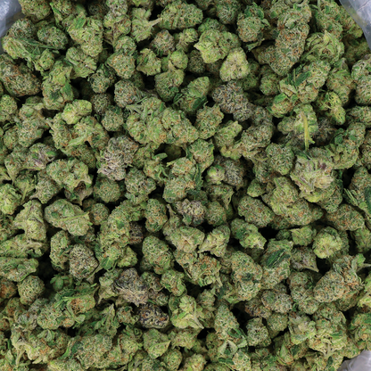 Close-up of Bubble Gum x Ogre THCa Smalls Flower from Miracle of the Desert, showcasing dense, colorful cannabis buds.