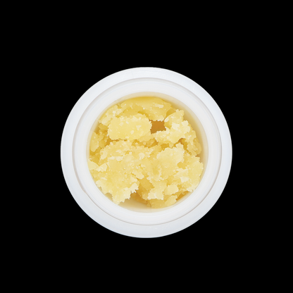 White Widow THCa Crumble extract from Miracle of The Desert, showing a white, crumbly cannabis concentrate on a clean surface.