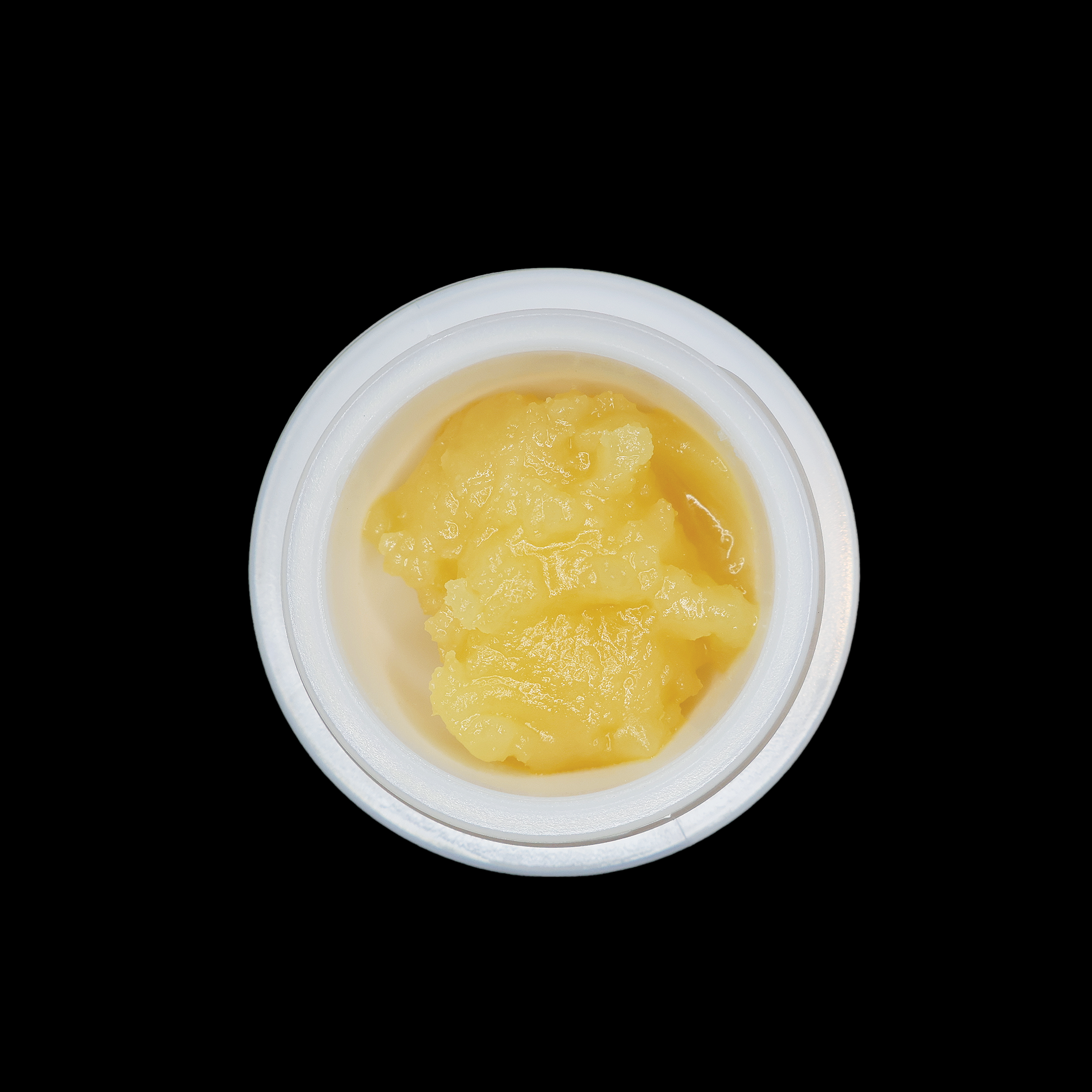Miracle of The Desert Georgia Apple Pie THCa Badder, close-up of golden, textured cannabis concentrate in a clear container.