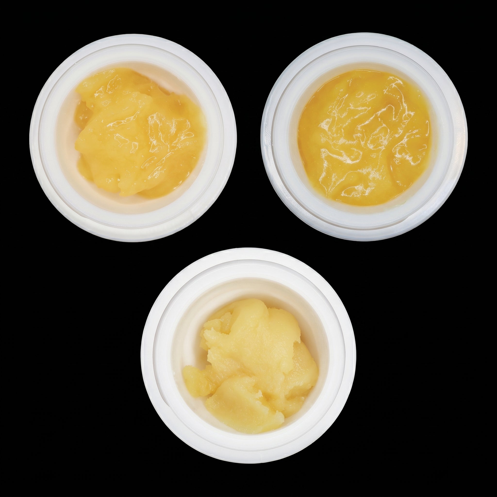 Miracle of The Desert THCa Badder Sample Bundle with three assorted extract containers, showcasing colorful, textured cannabis concentrates.